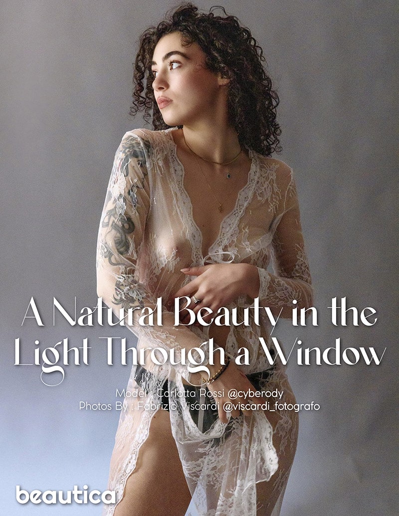 A NATURAL BEAUTY IN THE LIGHT THROUGH A WINDOW - Carlotta Rossi Modella- Cover
